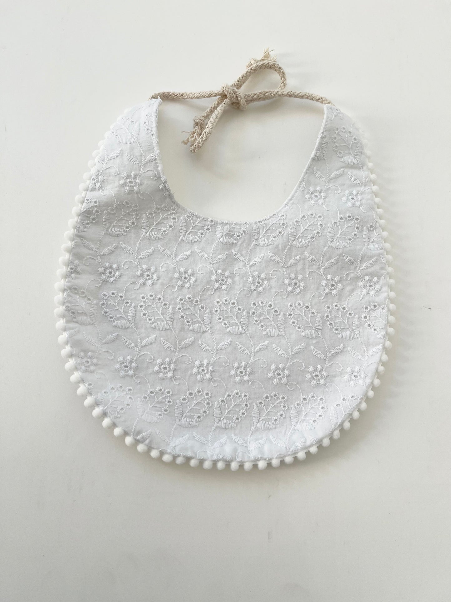 White flower embroidery bib